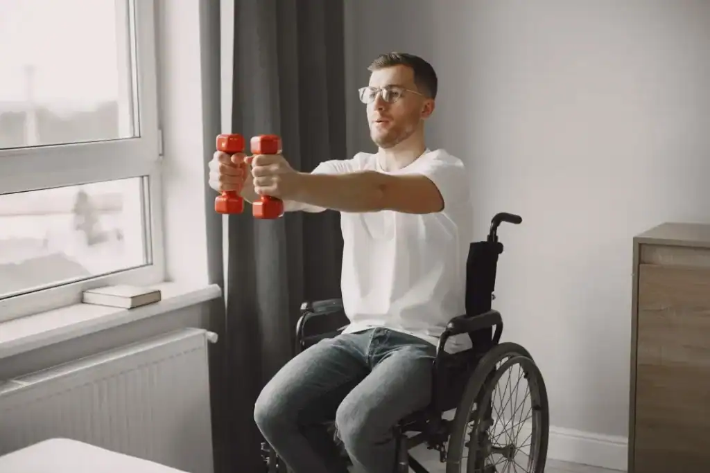 Empowering Weight Loss: A Comprehensive Guide for Individuals with Disabilities 1 Image of man doing exercise in his wheelchair to aid weight loss West Mersea