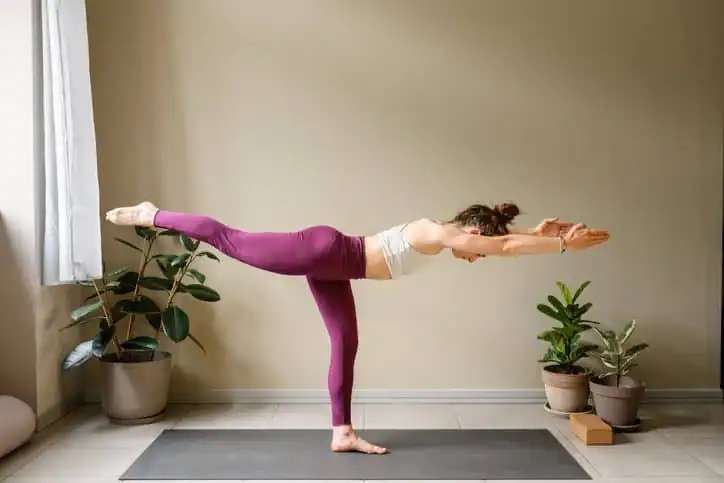 Achieving the Perfect Tone: How Often Should You Exercise for Results? 1 Woman doing Yoga exercise West Mersea to help with toning the body.